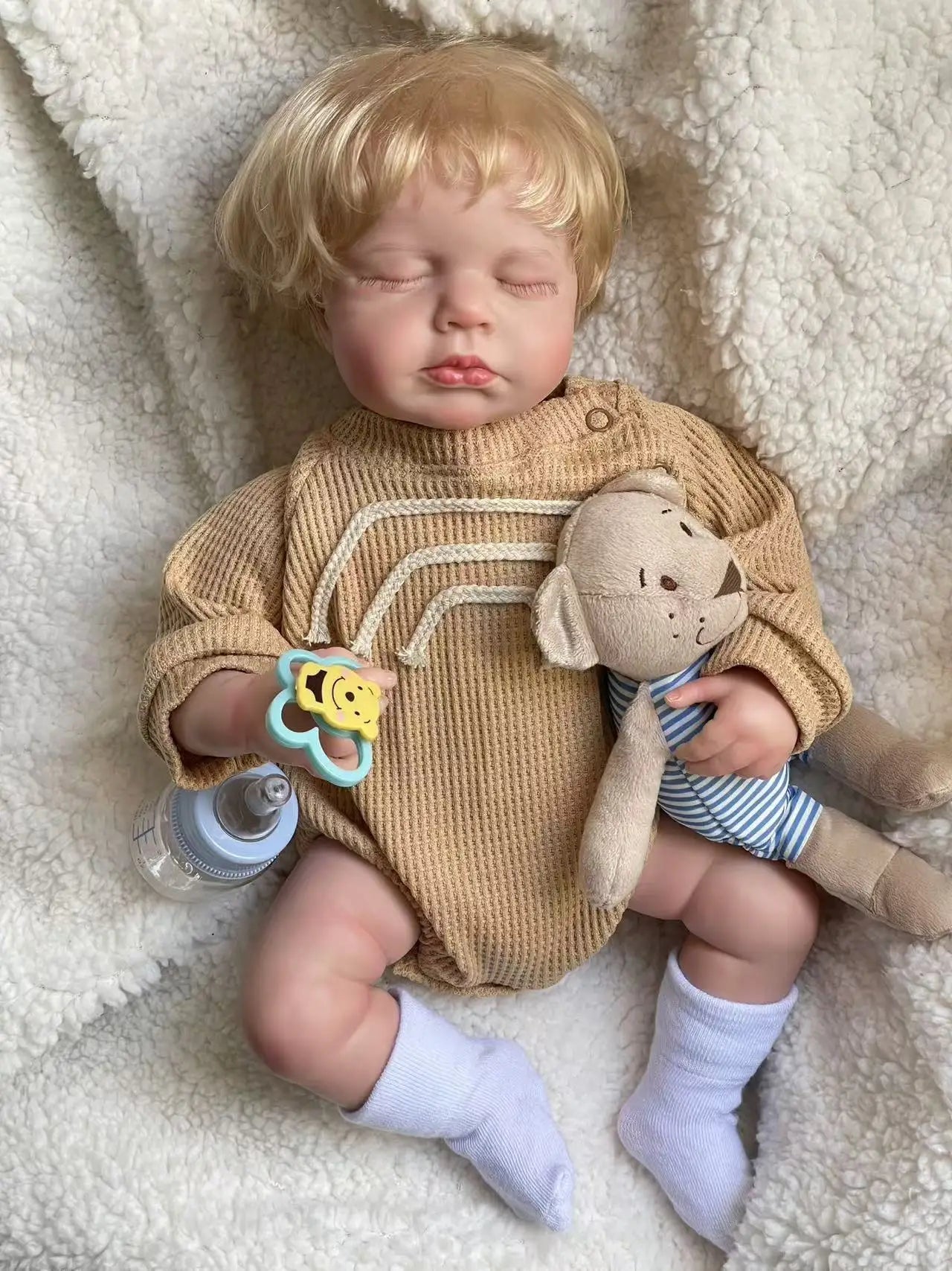 Ludovica bambola reborn in posizione dormiente